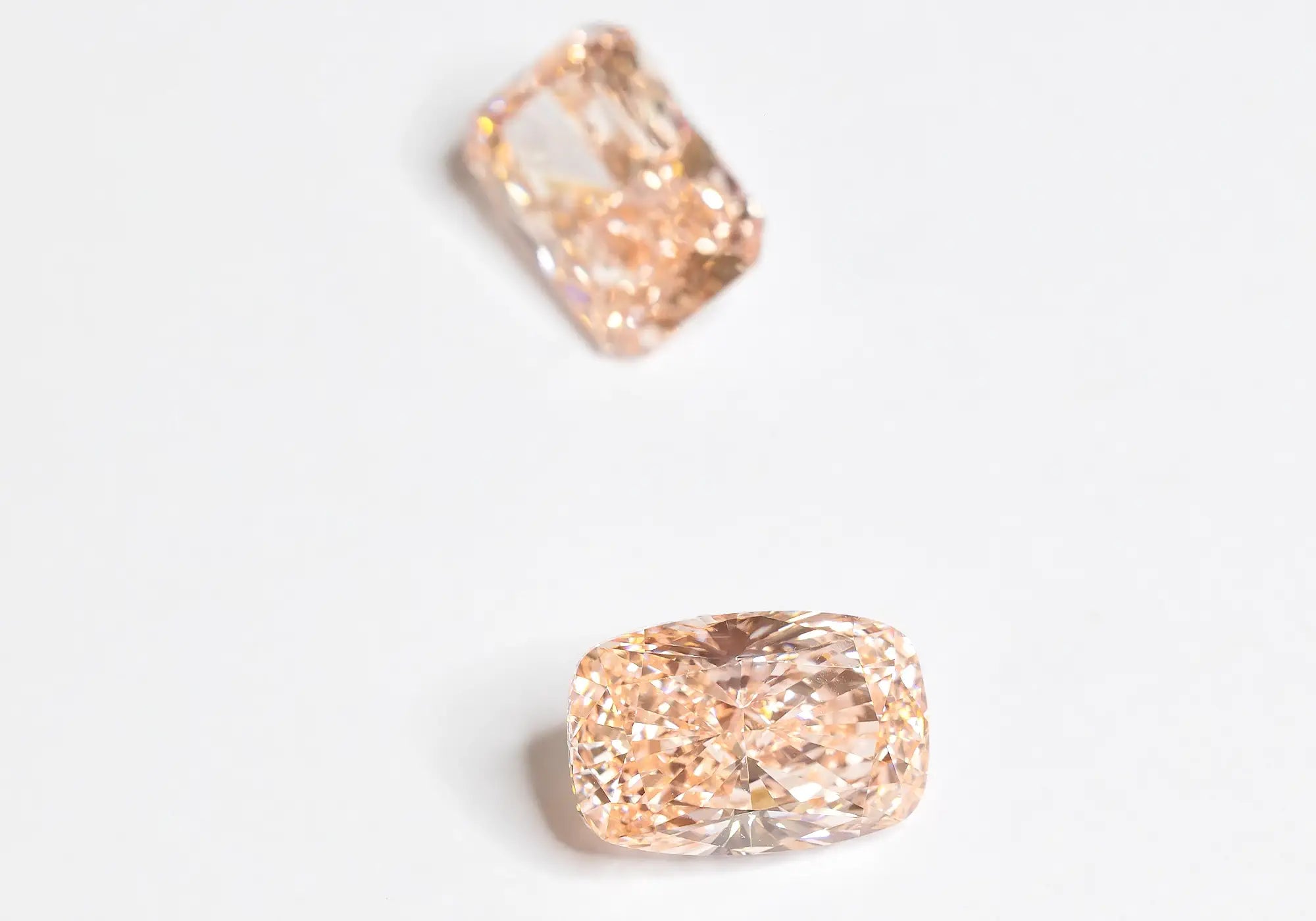 Pink Loose Lab-Grown Diamonds on two different shapes