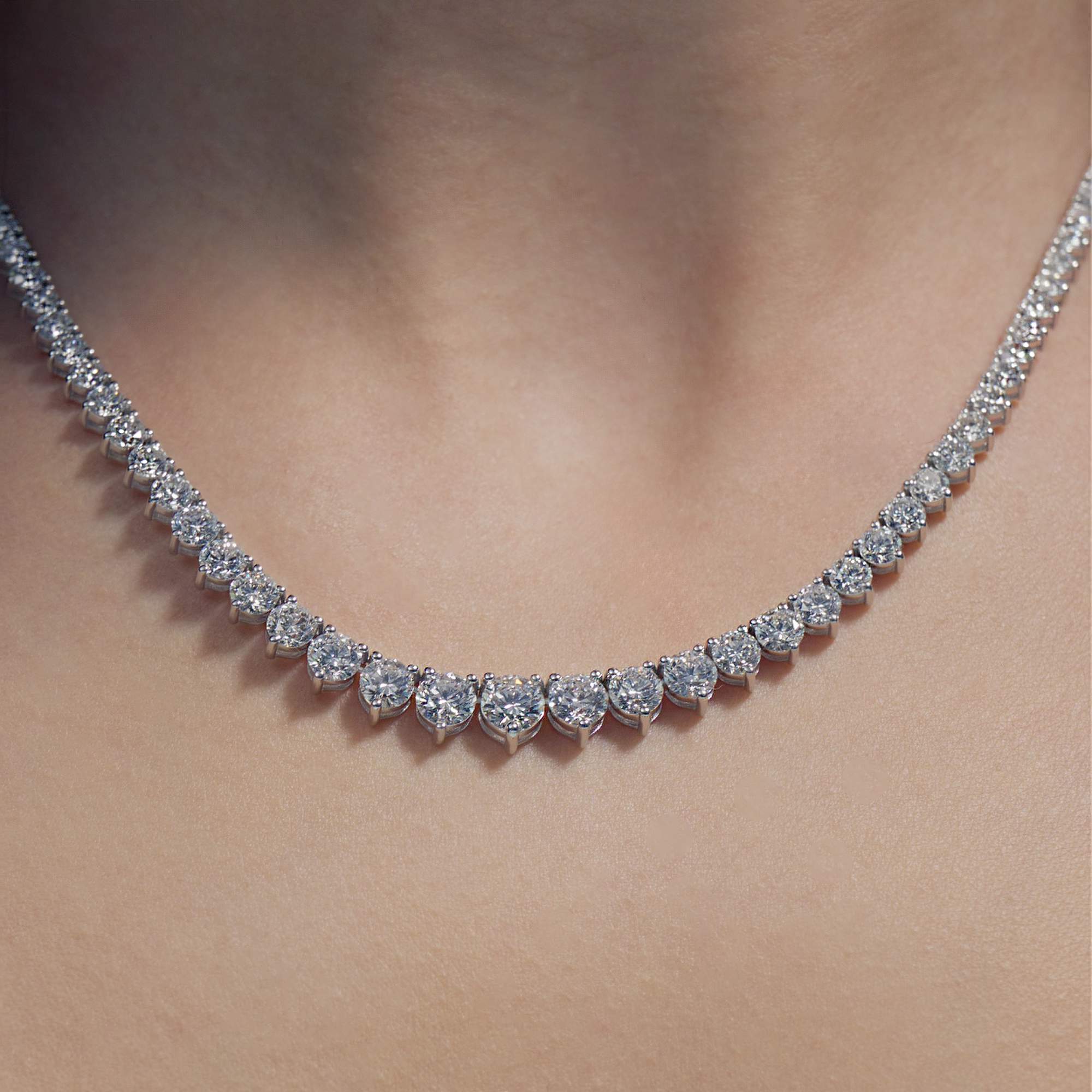  16.87ct Round Lab Diamond Tapered Tennis Necklace on model's neck 