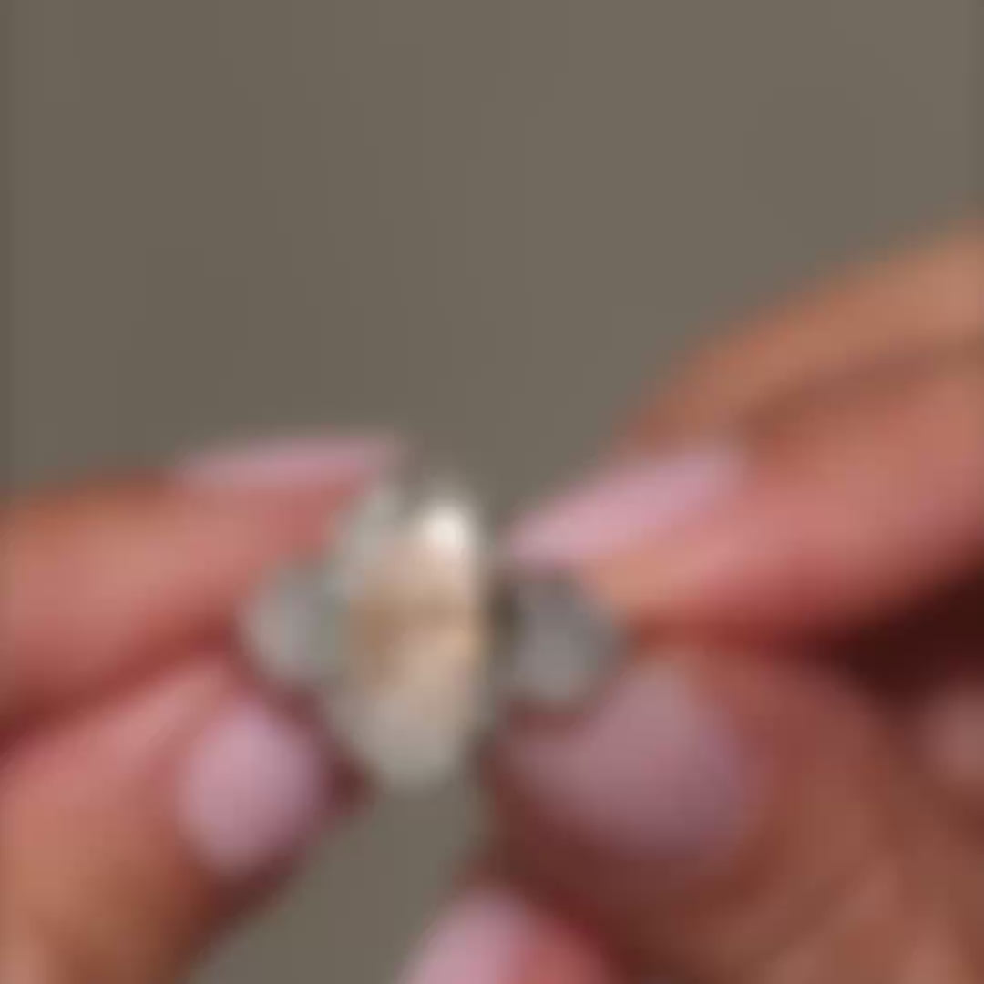 Luxury oval lab-grown diamond heart trilogy ring, 18K white gold, video highlighting 8.09ct diamonds and elegant design.