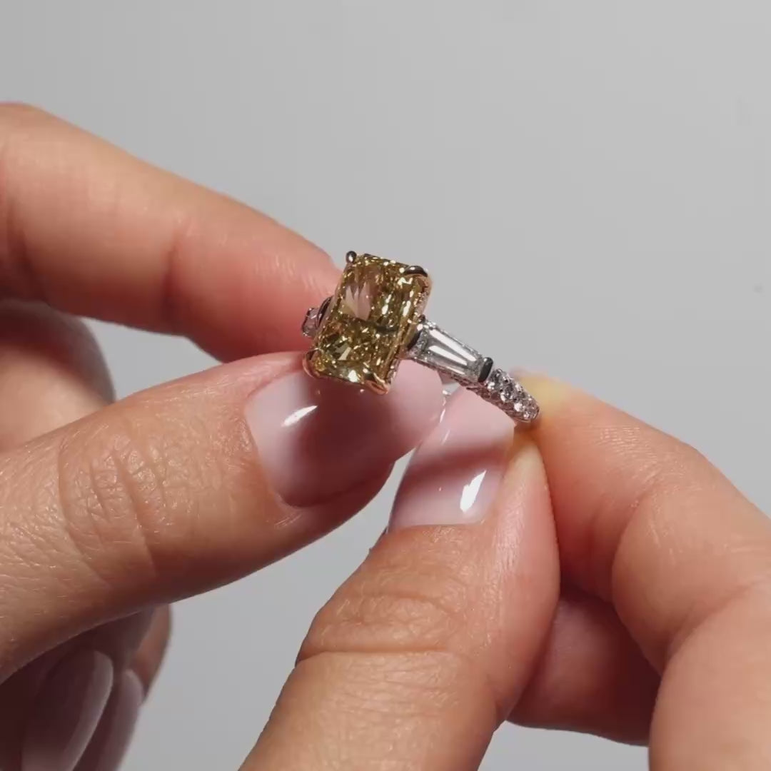 A Radiant Fancy Vivid Yellow Lab Diamond Tapers Trilogy video presentation 