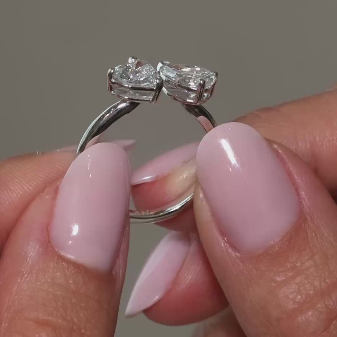 A video presentation of Pear and heart shape Lab diamonds Toi et Moi Ring in 18k white gold