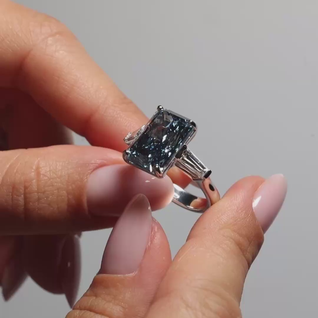 6.66ct Radiant Fancy Vivid Blue Lab Diamond Tapers Trilogy shown on the video presentation 