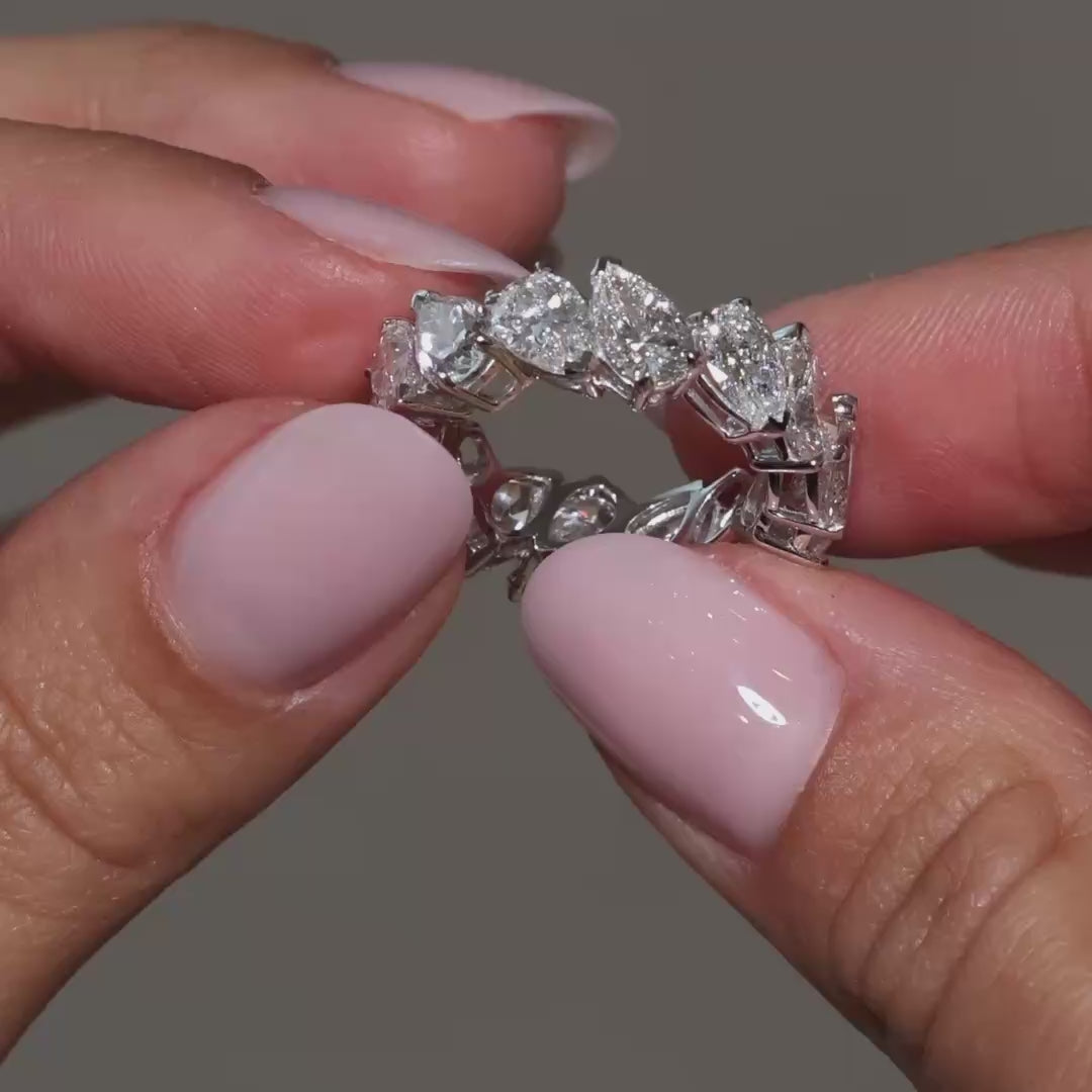Pear-shaped lab-grown diamond eternity ring in 18K white gold, video highlighting sparkling diamonds around the band